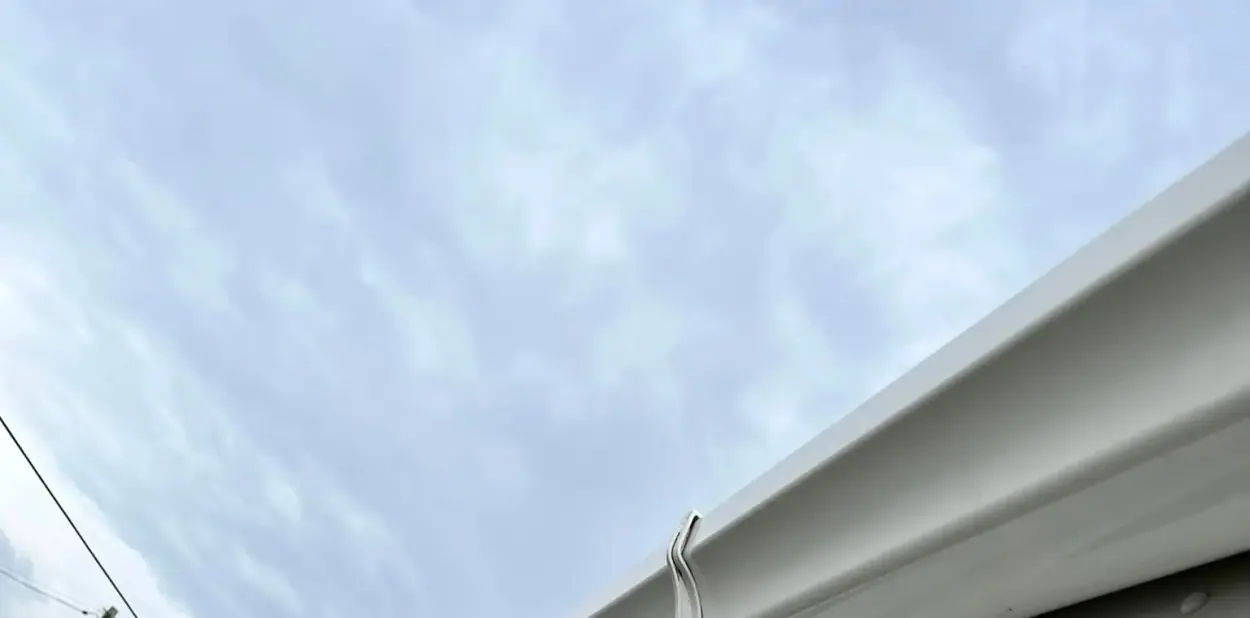 White guttering and fascia after exterior cleaning